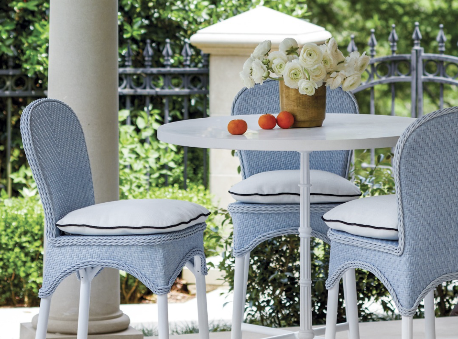 Outdoor bar table and stools on a patio